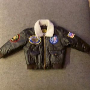 Pleather jacket size 4 with cool patches! In good condition!